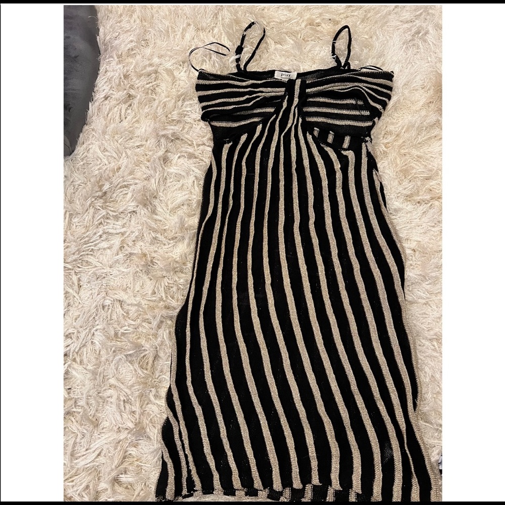 Black and gold striped cutout knit dress